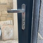 Black frame door frame with chrome handles